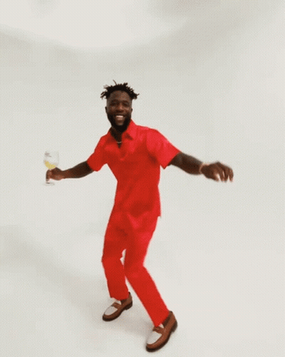 Man In Red Shirt Holding Champagne Glass GIF