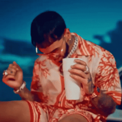Man In Red Shirt Holding Cup And Cigarette GIF