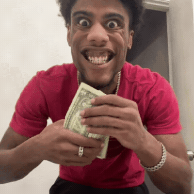 Man In Red Shirt Holding Dollar Bill In Mouth GIF