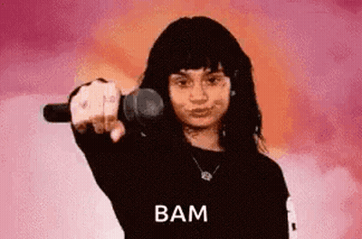 Man In Red Shirt Holding Microphone Says Nuff Said GIF