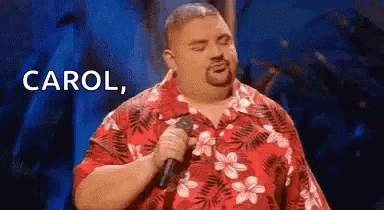 Man In Red Shirt Holding Microphone Singing GIF