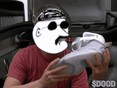 Man In Red Shirt Holding Shoe With Cartoon Face $ Dood GIF