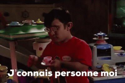 Man In Red Shirt Holding Tea At Toy Kitchen GIF