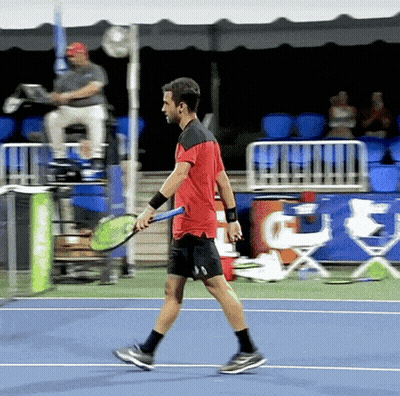 Man In Red Shirt Holding Tennis Racket GIF