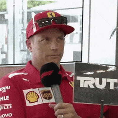 Man In Red Shirt Holding Truth Sign GIF