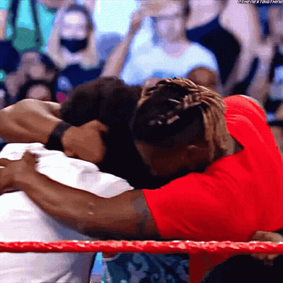 Man In Red Shirt Hugging Another GIF