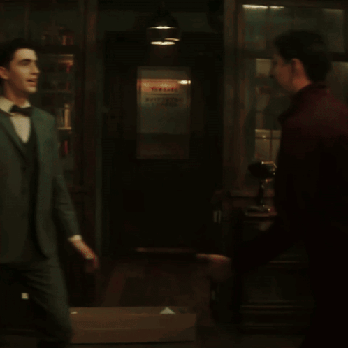 Man In Red Shirt Hugging Man GIF