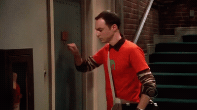 Man In Red Shirt In Front Of Door Saying Comique De Repetition GIF
