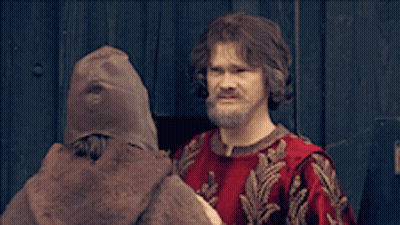 Man In Red Shirt In Front Of Joke That I'm Sign GIF