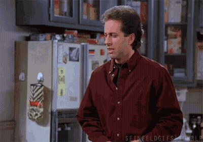 Man In Red Shirt In Front Of Refrigerator GIF