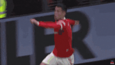 Man In Red Shirt Jumping Soccer GIF