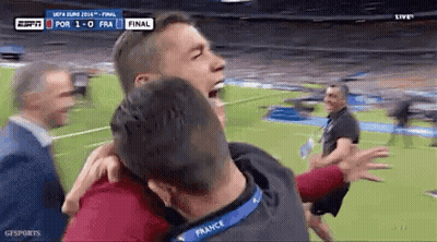 Man In Red Shirt Kicking Soccer Ball On Field GIF