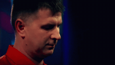 Man In Red Shirt Looking Down GIF