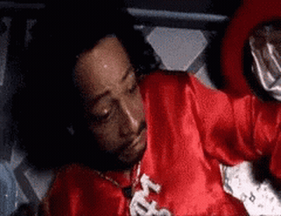 Man In Red Shirt Lying In Bed GIF
