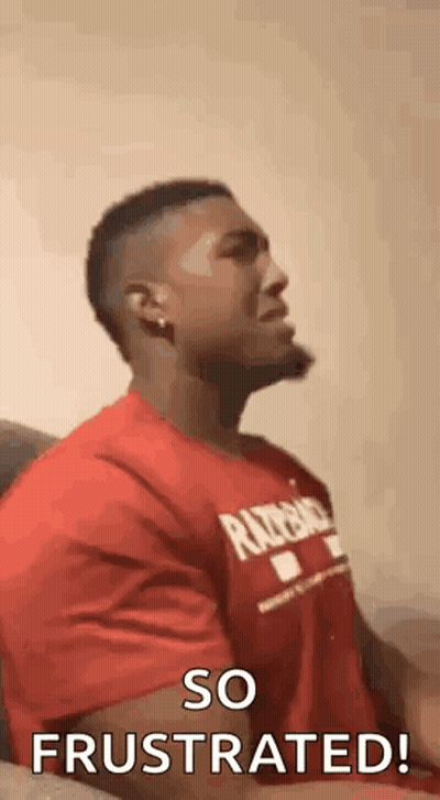 Man In Red Shirt Making Face GIF