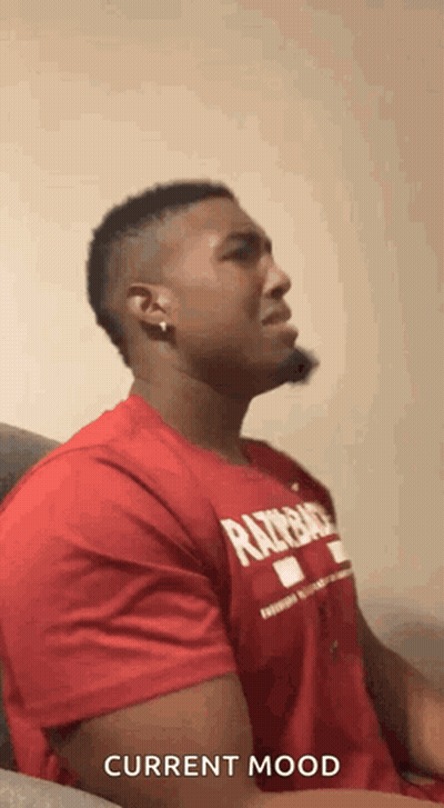 Man In Red Shirt Making Face GIF