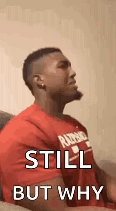 Man In Red Shirt Making Face On Couch GIF
