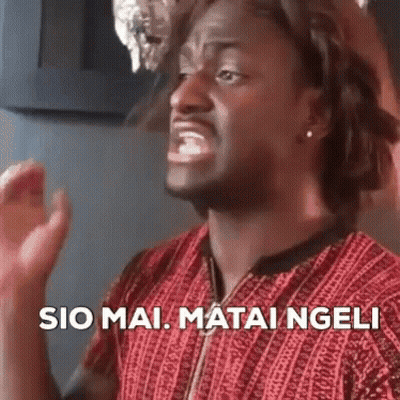 Man In Red Shirt Making Funny Face Saying Sio Mai Matai Ngeli GIF