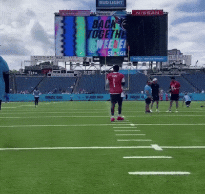 Man In Red Shirt Number 1 Running On Field GIF