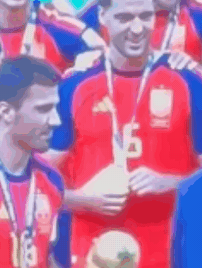 Man In Red Shirt Number 18 Holding Trophy GIF
