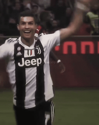 Man In Red Shirt Number 7 Jumping On Soccer Field GIF