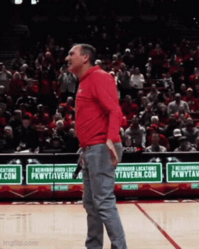 Man In Red Shirt On Basketball Court In Front Of PkwyTavern.com Sign GIF