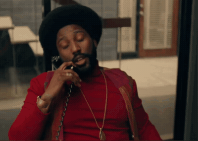 Man In Red Shirt On Phone GIF