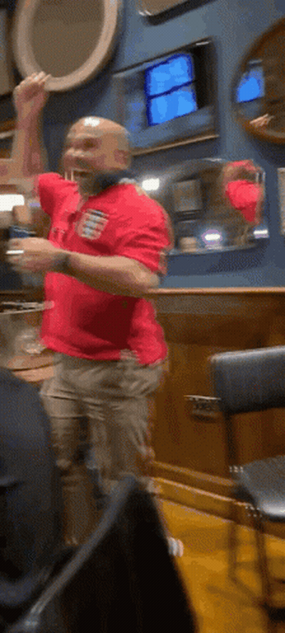 Man In Red Shirt Playing Guitar In Front Of Microphone GIF