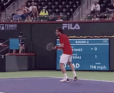 Man In Red Shirt Playing Tennis GIF