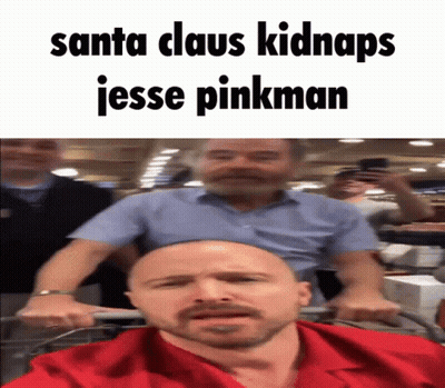 Man In Red Shirt Pushing Shopping Cart GIF