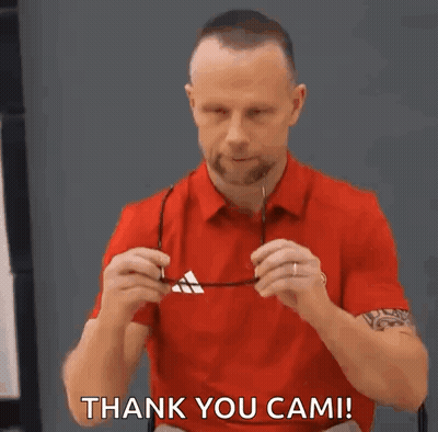 Man In Red Shirt Putting On Glasses Saying Thank You Cam GIF