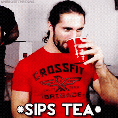 Man In Red Shirt Saying Crossfit Brigade Drinking From Red Cup GIF