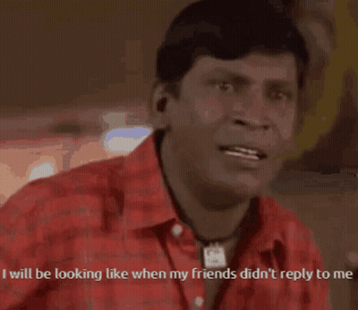 Man In Red Shirt Saying I Will Be Looking Like When My Friends Didn't Reply To Me GIF