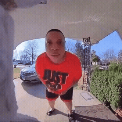 Man In Red Shirt Saying Just Do On Porch GIF