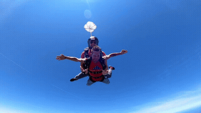 Man In Red Shirt Saying Mighty Flying With Another Man GIF