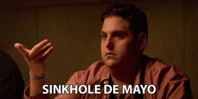 Man In Red Shirt Saying Sinkhole De Mayo GIF