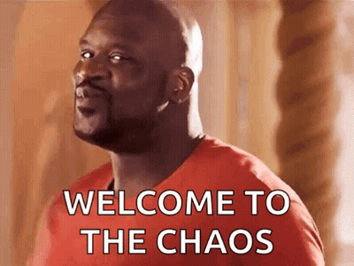 Man In Red Shirt Saying Welcome To Chaos GIF