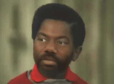 Man In Red Shirt Saying What You Talkin Bout GIF