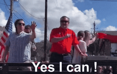 Man In Red Shirt Says Yes I Can In Front Of Crowd GIF
