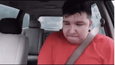 Man In Red Shirt Sitting In Car GIF