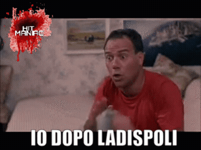 Man In Red Shirt Sitting On Couch Saying Io Dopo Ladispoli GIF