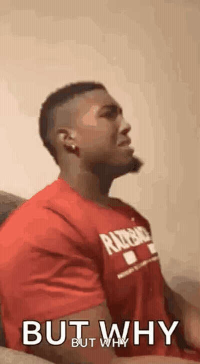 Man In Red Shirt Sitting On Couch Talking GIF