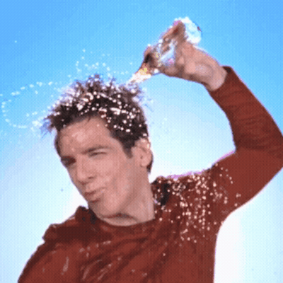 Man In Red Shirt Spraying Bottle GIF