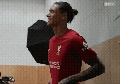 Man In Red Shirt Standard Chartered GIF