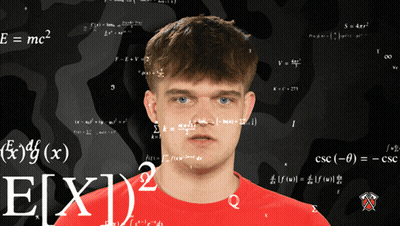 Man In Red Shirt Standing Before Blackboard GIF