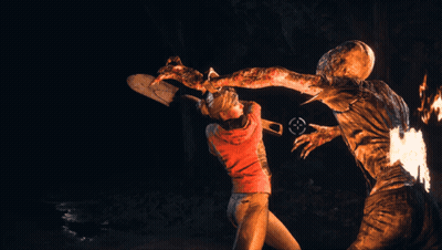 Man In Red Shirt Standing Beside Burning Monster GIF