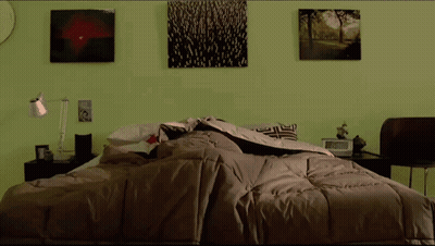 Man In Red Shirt Standing In Bed GIF