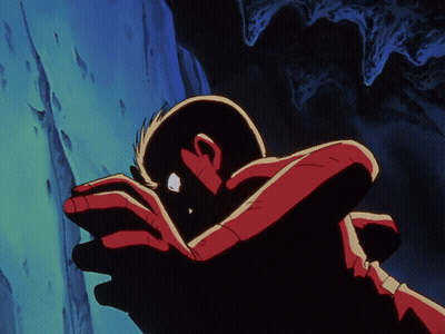 Man In Red Shirt Standing In Front Of Wall GIF