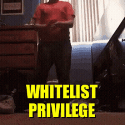 Man In Red Shirt Standing In Front Of Whitelist Privilege Sign GIF
