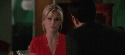 Man In Red Shirt Standing Next To Another Man GIF